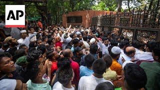 Protesters storm Bangladesh PM Sheikh Hasinas residence after her resignation [upl. by Corydon]