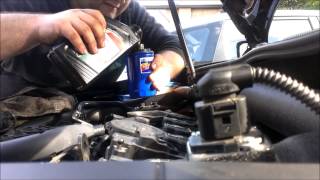 How to change Engine oil on a 2009 Volkswagen GTI [upl. by Ellene]