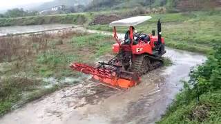 2 Crawler tractor with implements work in paddy field from Vivian [upl. by Anailuy]