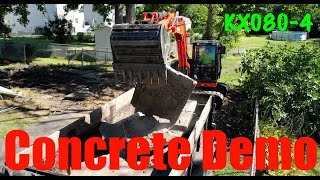 Kubota KX080 Excavator demolishing concrete patio and footing [upl. by Yrrok]