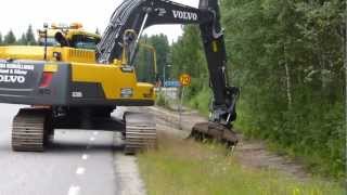 Volvo EC250DL ditching with Oilquick Rototilt [upl. by Nue901]