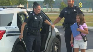 Toledo police escort daughter of fallen officer to her first day of school [upl. by Rolyak]