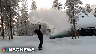 WATCH Boiling water turns into snow and ice in freezing Finland [upl. by Nyliret]