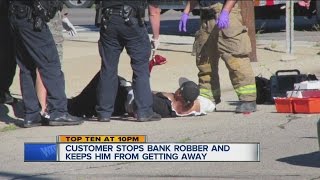 Bank robber shot by customer [upl. by Etteinotna]