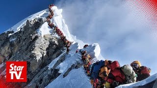 Another climber dies descending Everest [upl. by Ellimak]