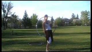 SaFire Hooping Tutorial Vertical Step Through  Learn online at Hoopcityca [upl. by Paulina863]