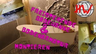 Freistehende Badewanne und Bodenarmatur werden montiert [upl. by Lyrak]