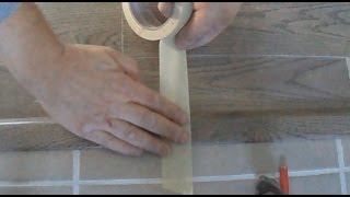 Laminate floor installation How to Install Overlap Transition to Tile Mryoucandoityourself [upl. by Nho212]