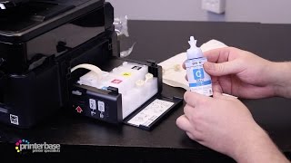 How to refill ink on Epson EcoTank Printers  printerbasecouk [upl. by Yrac]