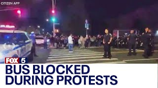 NYC migrant crisis Staten Island demonstrators block bus during protests [upl. by Orsino]