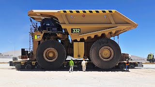 Towing Large Vehicles Cat 797B  Cat 794 AC Truck amp Cat 854K Wheel Dozer [upl. by Haliak]