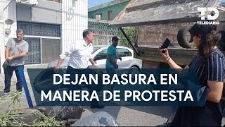 Trabajadores de Simeprode arrojan basura en casas de diputados tras aprobación de Ley de Residuos [upl. by Ledah]