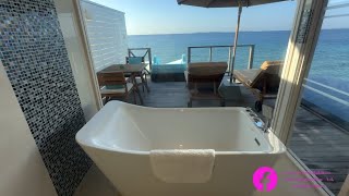 Siyam world Maldives Ocean water villa with pool and water slide [upl. by Conney475]