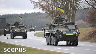 Hundreds of Stryker Armored vehicles convoyed into Ukraine [upl. by Eelyrag]