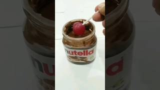 Nutella amp Lollipop Candy Dipping videoshort yummy nutella [upl. by Cahn]