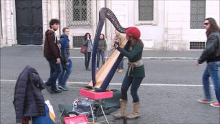 Street artist Harpist plays Yann Tiersen Comptine dun autre été cover [upl. by Eiffub309]