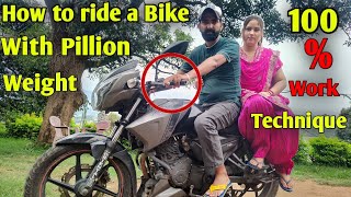 How to ride bike with pillion weight  How to ride with pillion heavy weight [upl. by Okikuy]