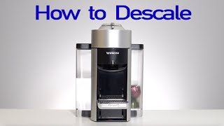 How to Descale Nespresso Machine [upl. by Anoirtac612]