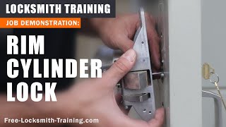 Replace Rim Cylinder  How to Install New Lock on Push Bar Exit Door  FreeLocksmithTrainingcom [upl. by Erialb175]