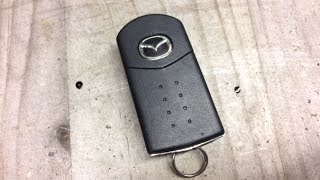 How to change a dead battery on a Mazda key fob [upl. by Suzette496]