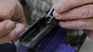 LaserMax Guide Rod Laser Slide Lock Spring installation for GLOCK [upl. by Nottirb]