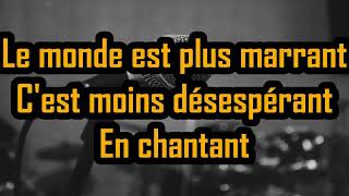 En chantant  Michel Sardou  Paroles  Lyrics [upl. by Attennhoj]