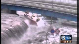 Incredible video of tsunami wave hitting Japan town [upl. by Main]