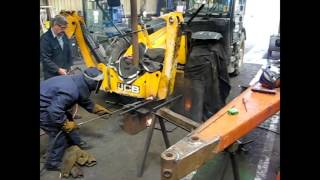 Removing seized leg pins on a telehandler truck using the thermal lance [upl. by Deacon753]