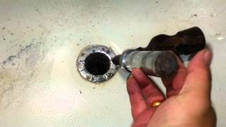 How to remove a broken or damaged tub drain [upl. by Anaicul]