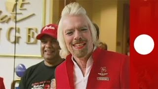 Virgin Group founder Richard Branson works as stewardess for a day [upl. by Macmillan]