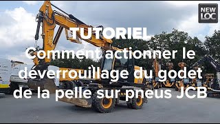 Comment actionner le déverrouillage du godet de la pelle sur pneus JCB   NEWLOC [upl. by Hudgens]