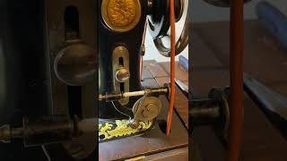 Bobbin Winding on 1900s National Treadle Sewing Machine [upl. by Reifinnej]