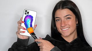 I Surprised Charli DAmelio With 20 Custom iPhones [upl. by Juditha]