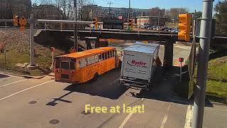 Boxtruck wrestles with 11foot8 bridge while train crosses [upl. by Hestia]