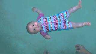 Baby swimming  floating unassisted at 5 months old [upl. by Genie]