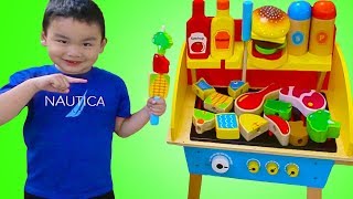 Lyndon Pretend Play Grilling on WOODEN BBQ Grill Cooking Toy [upl. by Llertnauq53]