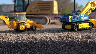 Construction toys  Hot wheels Matchbox and NORSCOT CAT 966G Wheel Loader at construction site￼ [upl. by Odnamla549]