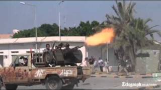 Libya conflict rebels fight their way into Col Gaddafis compound [upl. by Nonac]