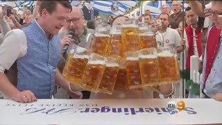 German Man Sets New BeerCarrying World Record [upl. by Veejar]