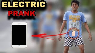 ELECTRIC PHONE quotPUBLIC PRANKquot  Social experiment [upl. by Netsrijk595]