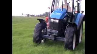 New Holland TS 110 Mowing [upl. by Halas]