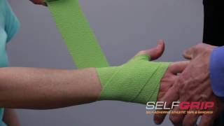 How to tape wrist injuries using SelfGrip®  demonstrated by Dr Overland [upl. by Acnaib799]