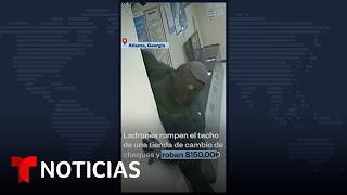 Ladrones rompen el techo de una tienda de cambio de cheques y roban 150000  Noticias Telemundo [upl. by Shirk148]