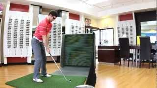 An indoor golf hitting practice net SwingBox revolutionary Amazing [upl. by Omolhs]