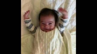 Cute baby throws his hands up after being unswaddled  KPtheBaby [upl. by Amoreta499]