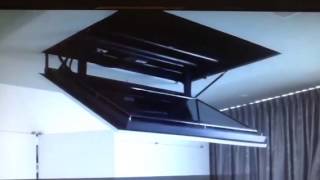 Motorized flip down flat screen TV ceiling mount [upl. by Rudiger548]