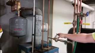 How To Remove Air From Your Heating System [upl. by Mozes]