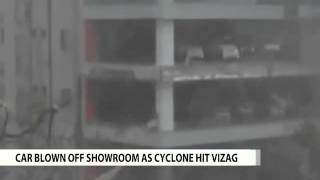 Caught on Camera Car blown off showroom as Cyclone Hudhud hit Vizag [upl. by Simdars]