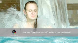 Woman under water shower in the swimming pool [upl. by Milburt615]