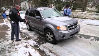 Raleigh police help stuck motorist up icy hill [upl. by Nylodnewg]